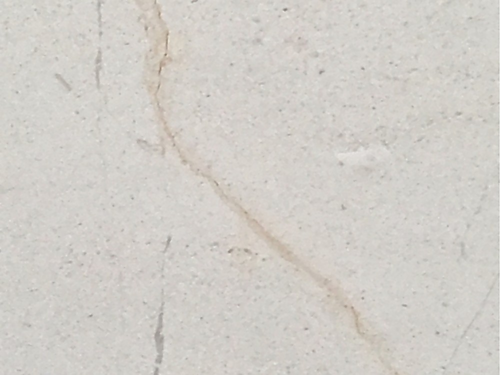 Mármol Bellagio color crema claro con veta dorada