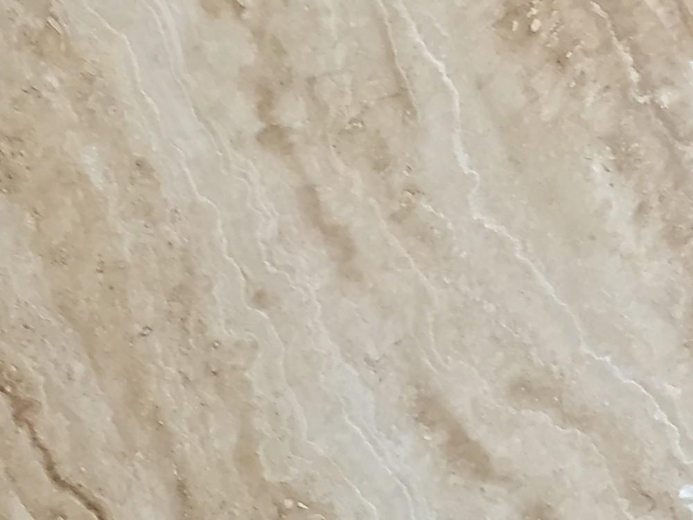 Mármol Serpentino en tono arena con veta suave