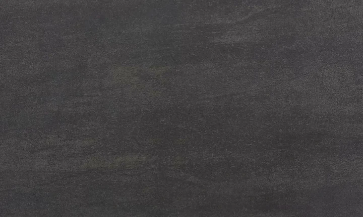 Dekton Bromo acabado mate, gris oscuro con textura de cemento