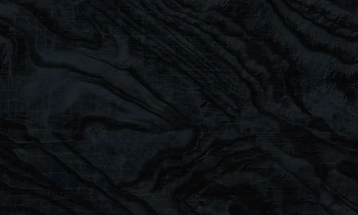 Dekton Liquid Embers acabado mate, negro profundo con ondulado metálico